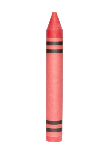 Red wax crayon with two black bands on a clean, neutral white background. Artistic materials.