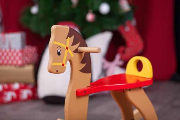 istock Christmas composition with wooden rocking horse 2180288910