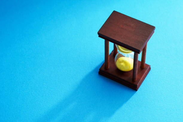 Sandglass on the blue background.
