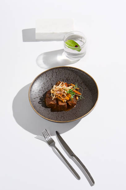istock Gourmet Beef Tenderloin with Mushroom Sauce in Minimalist Composition 2180294687