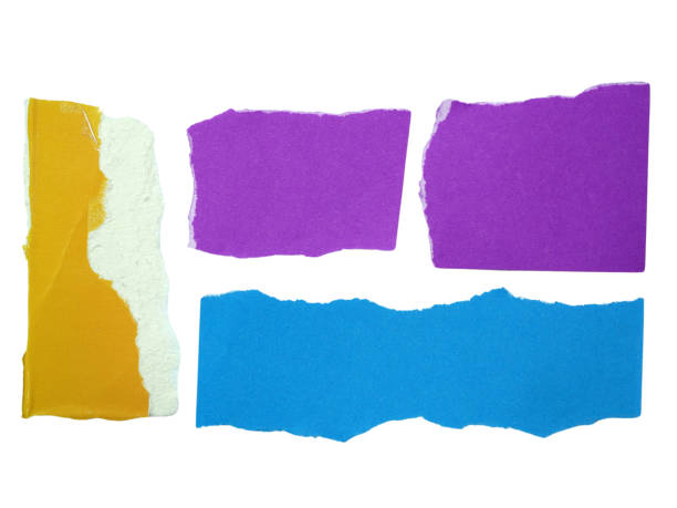 istock Several pieces of multi-colored torn-edge paper isolated on white background with clipping path. 2180295318