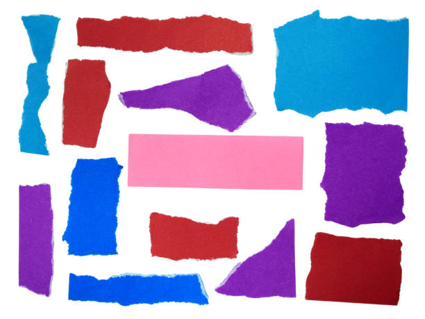 istock Several pieces of multi-colored torn-edge paper isolated on white background with clipping path. 2180295330