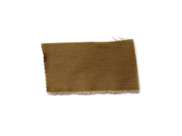 istock A piece of brown material isolated on a white background. 2180296561