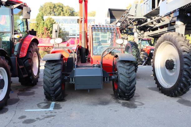 istock The Compact Tractor equipped with a Loader showcased at the Agricultural Exhibition event 2180296988