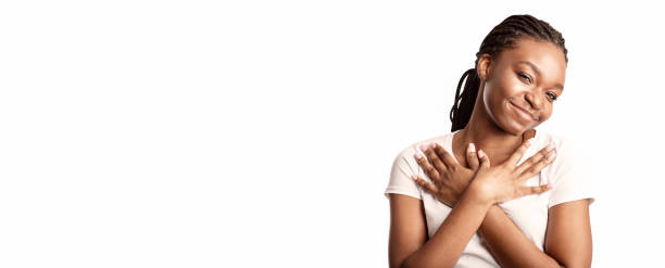 istock Thankful Black Lady Pressing Hands To Chest, Studio Shot 2180300128