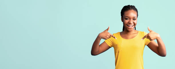 istock African American Lady Pointing Fingers At Herself On Blue Background 2180300215
