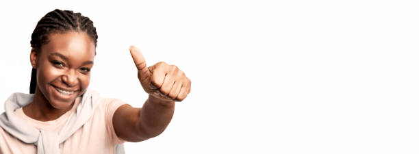 istock African Millennial Lady Gesturing Thumbs Up Posing On White Background 2180300291