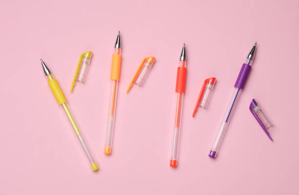 istock Colored pens on a pink background. Top view 2180305303