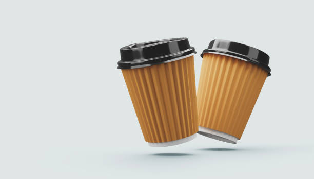 istock Paper coffee cups with black lid on sorft pink background mockup 3d rendering 2180306001