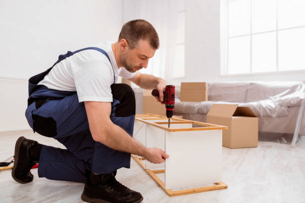 istock Handyman Using Electric Drill Making Furniture Assembly Indoors 2180306162