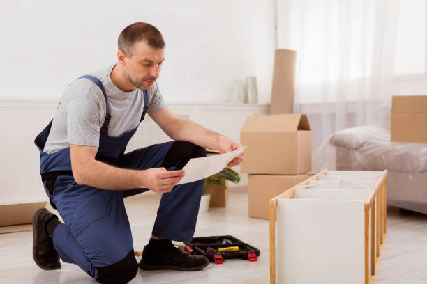 istock Workman Reading Instruction Installing Furniture Making Renovation Indoors 2180306225