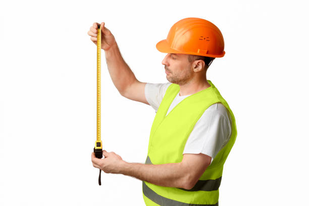 istock Building Engineer Worker Holding Tape-Measure Standing Over White Background, Studio 2180306350