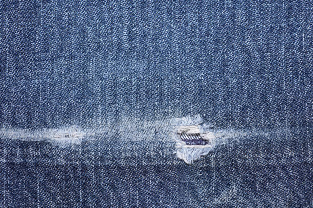 istock Texture of faded jeans close-up 2180306805