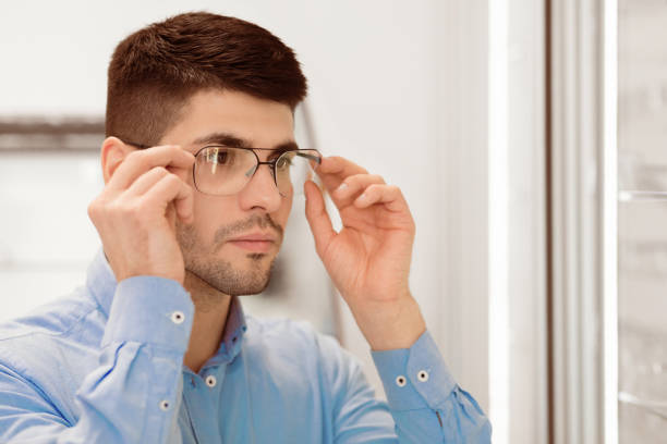 istock Portrait of handsome young guy wearing spectacles 2180309027