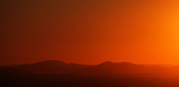 Seascape the background of the red sunset sky.
