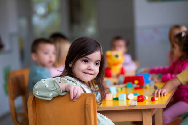 istock little cute kids are in kindergarten 2180327315