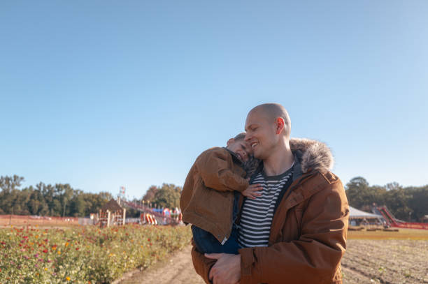 istock Loving Dad at a Flower Field 2180330135