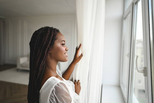 istock beautiful black woman portrait. 2180333611