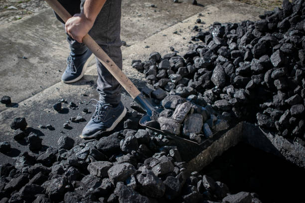 istock supplies of hard coal for winter. heating fuel 2180337821