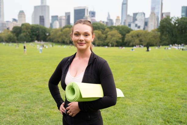 istock Yoga instructor portrait in Central Park 2180338654