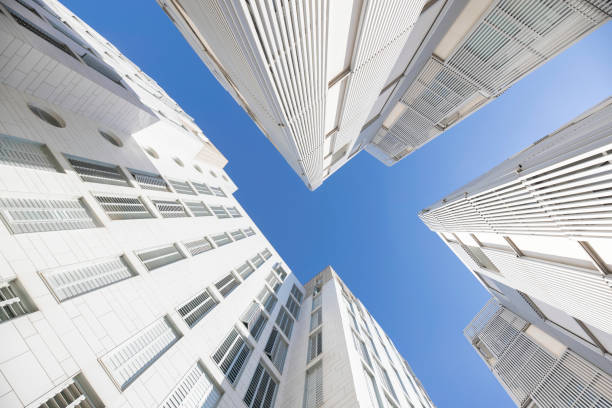 istock Exploring Modern Urban Architecture by looking up at the impressive structures around me 2180339707
