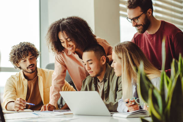 istock Diverse business team working together using laptop in the office 2180342455