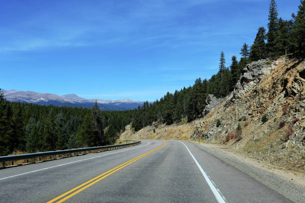 istock Curving Road Through Colorados Mountains 2180344082
