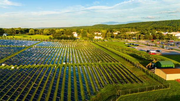 istock Clean alternative power generation in Pennsylvania. Solar farm installation powers rural community 2180356095