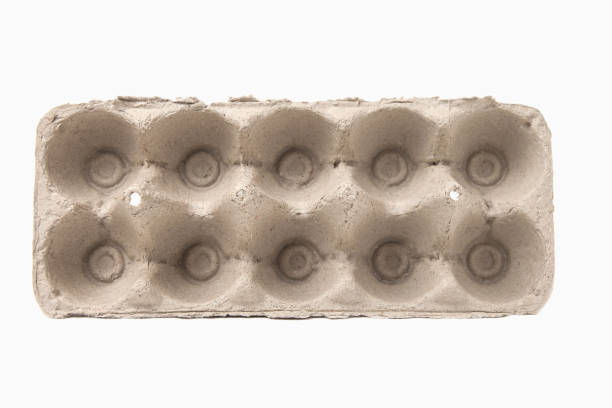 istock Rustic cartons made of biodegradable pressed fiber for storing ten eggs isolated on a white background 2180359916