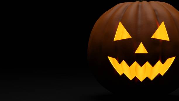 istock 3D rendering of Halloween pumpkin on dark background, with copy space. 2180362124