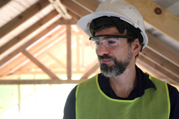 istock portrait of a builder at the construction site 2180365658