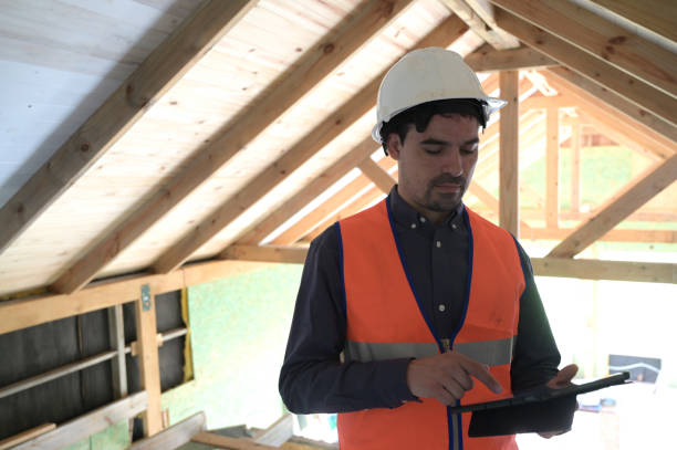 istock portrait of a builder at the construction site 2180365692