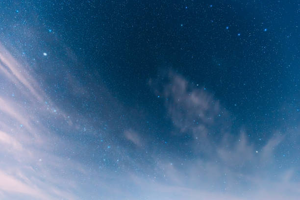 istock Natural Bold Blue Night Starry Sky Background. Calmness And Tranquility. Bright Dramatic Sky. Night Starry Sky In Blue Colors. Glowing Stars 2180367198