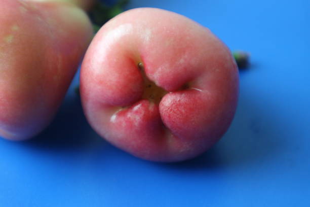Guava is greenish red on a blue background