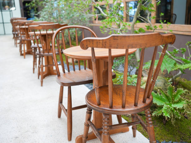 istock Wooden table and chairs in seating area 2180369519