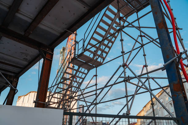 istock Urban Construction Site With Crane and Blue Sky Background 2180374744