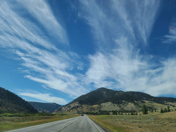 Late Spring POV from Moving Automobile Rear View Mirror Midwestern Rainy and Stormy Roadway Interstate 70 Travel in the Midwest POV from Moving Automobile Weather Events Photo Series with Matching 4K Video Available