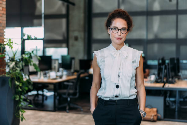 istock Confident businesswoman in modern office. 2180377522