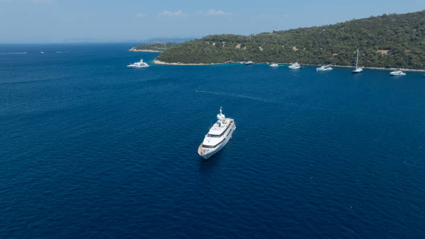 istock Luxury Yachts on Clear Water 2180381023