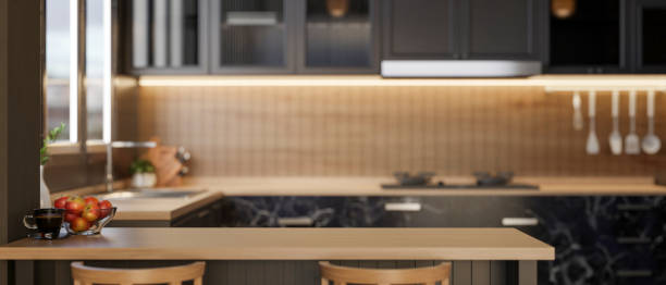istock A copy space on a modern wooden kitchen tabletop or kitchen island in a contemporary kitchen. 2180389155