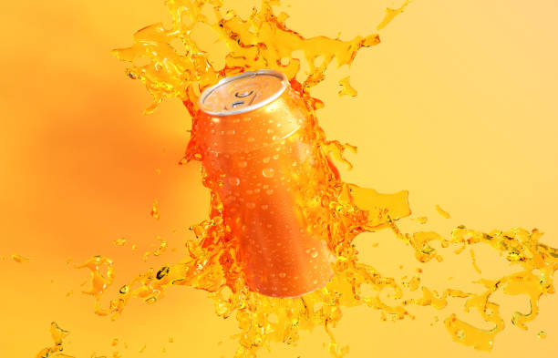 istock Soda can with splash on orange background 2180397123