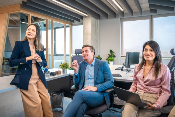 istock Diverse Business Leaders in Strategy Meeting at Modern Office 2180398129