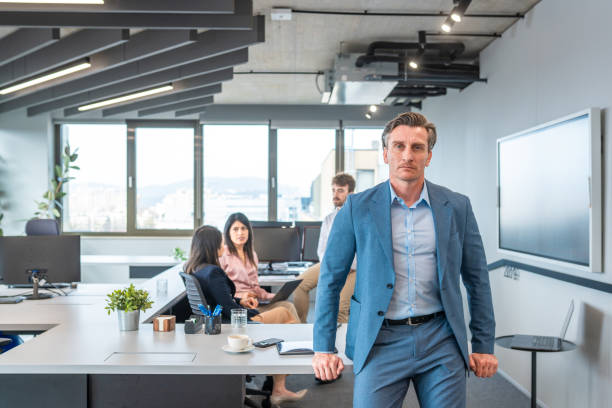 istock Senior Business Executive in Contemporary Office Setting 2180398131