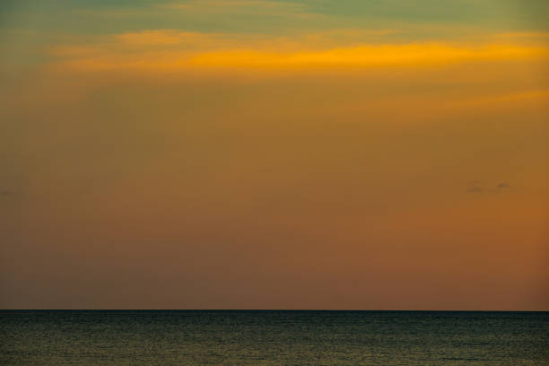 Skyline scenery Sunset in the evening sky with colorful clouds and beautiful cloud patterns In the soft light evening at the sea