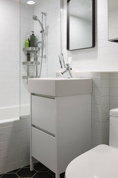istock white flush toilet in modern bathroom interior 2180405226