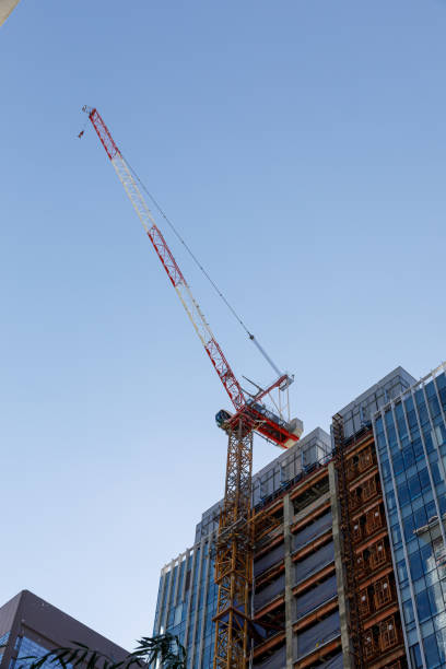 istock Picture of buildings under construction with construction crane 2180405439
