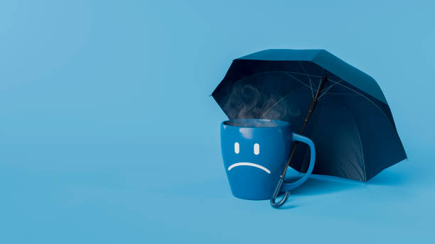 Coffee cup with sad face under an umbrella