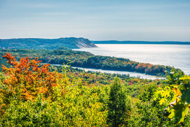 Lake Michigan and Autumn Leaf Color - Vibrant reds in Maple trees along the shores of Lake Michigan, USA.