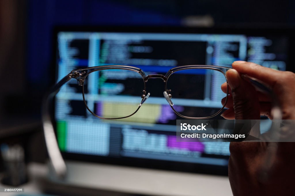 Code Through Lens Examining Code Reflections In Eyeglasses Lens Stock Photo - Download ...