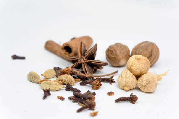 istock variation of different herbs and spices on white background. traditional spices. 2180420751